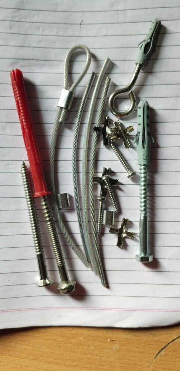 Anchor bolts, eye hooks, ferrules and framing screws used to fix invisible grills